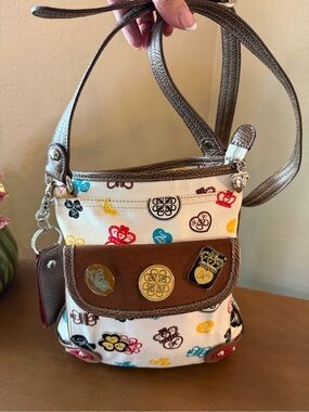 Kathy Van Zeeland Multicolor Logo Charm Crossbody Bag with Brown Trim